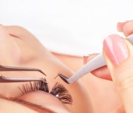 64296153 - eyelash extension procedure. woman eye with long eyelashes. lashes. close up, macro, selective focus